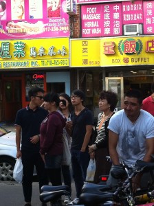 Local residents watch the proceedings